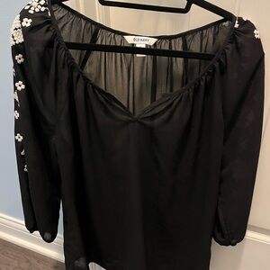 Black blouse with white flowers